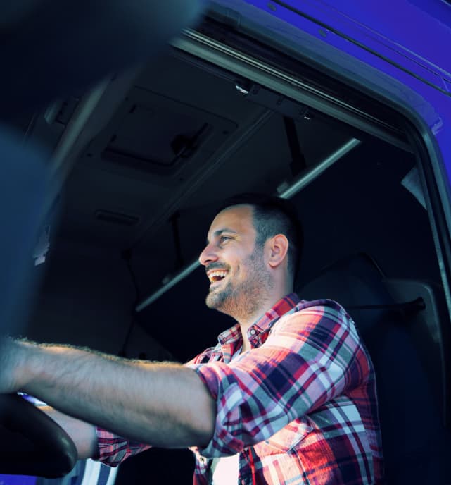 Man driving a truck